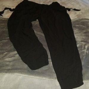 Black elastic waist pants with cuffed bottom